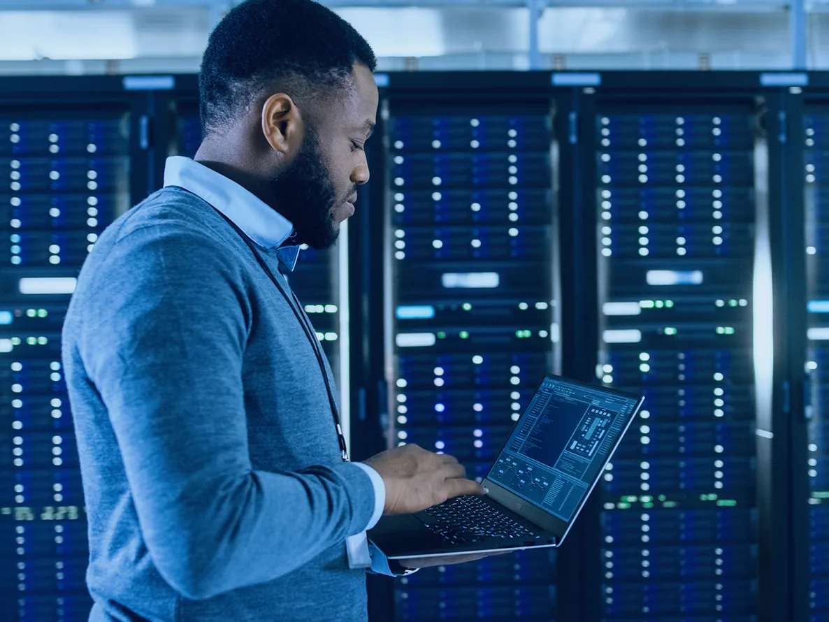 Cloud engineer working on a computer to capture the public cloud's fullest benefits.